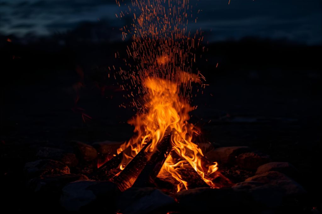 Uma imagem de uma fogueira calma e acolhedora em uma noite fria, com faíscas subindo para o céu. O fogo é controlado, simbolizando a paixão e a purificação.
